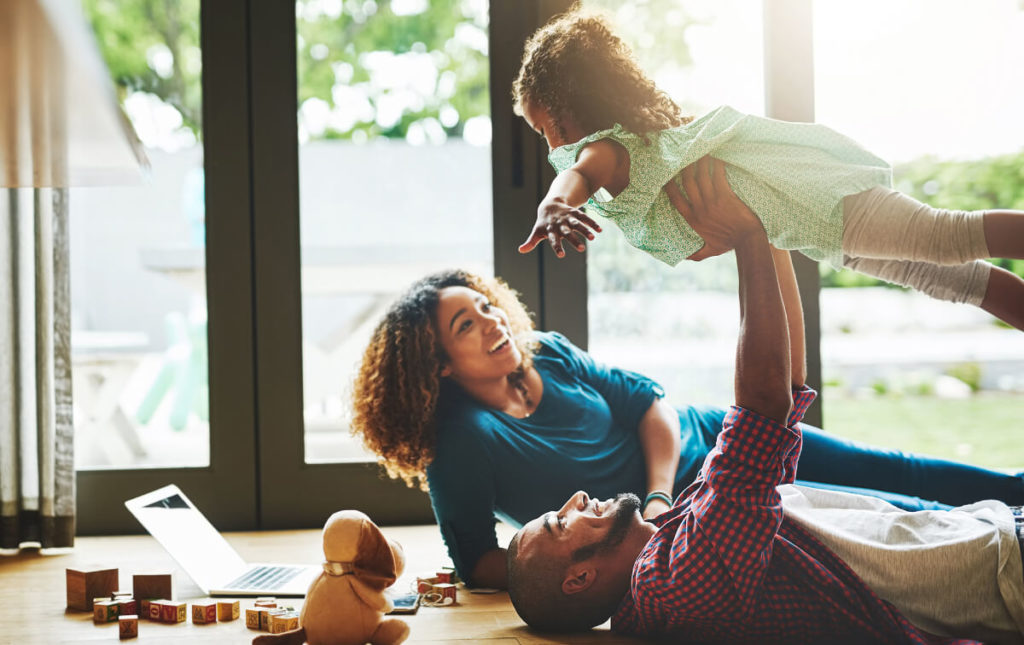 family at home on floor