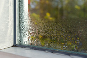 window with water drops closeup, inside
